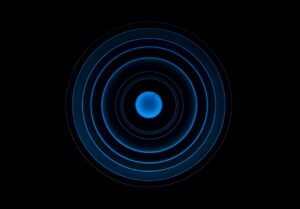Abstract blue concentric circle pattern on a black background, ideal for futuristic designs.
